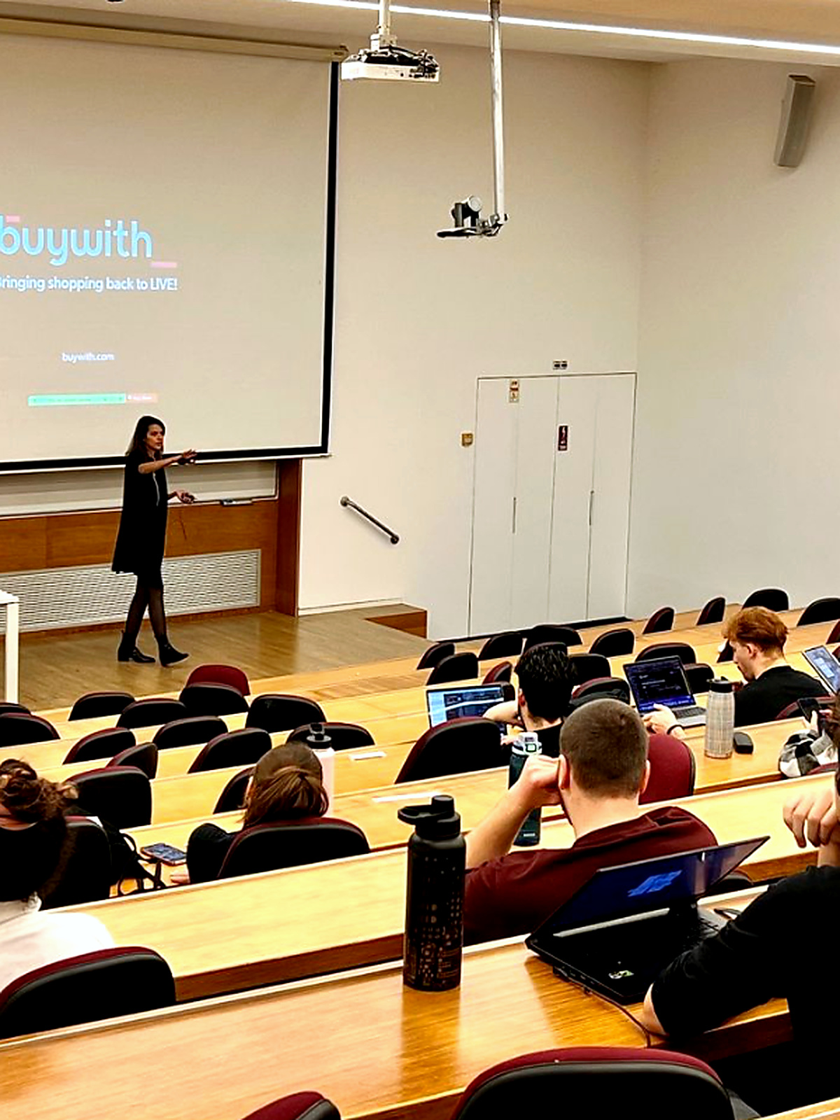 Adi presenting a guest lecture at Reichman University